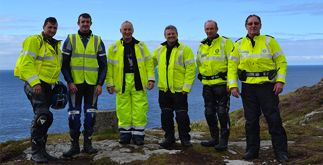 The support crew looking suitably windswept
